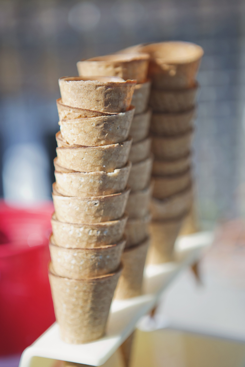A close up of ice cream cones stacked